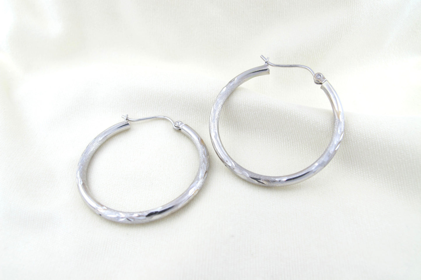 Silvana- 14KT White Gold 28mm diamond cut motif tubular hoop earrings