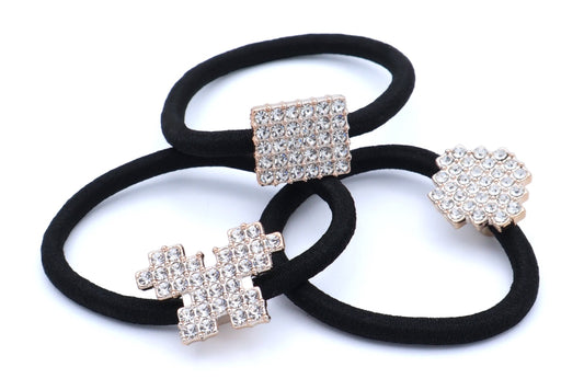 Lori -  3-Pak Hair Elastics With Gold Plated Rhinestone Studded Motifs..Asst Designs On Black Hair Elastic