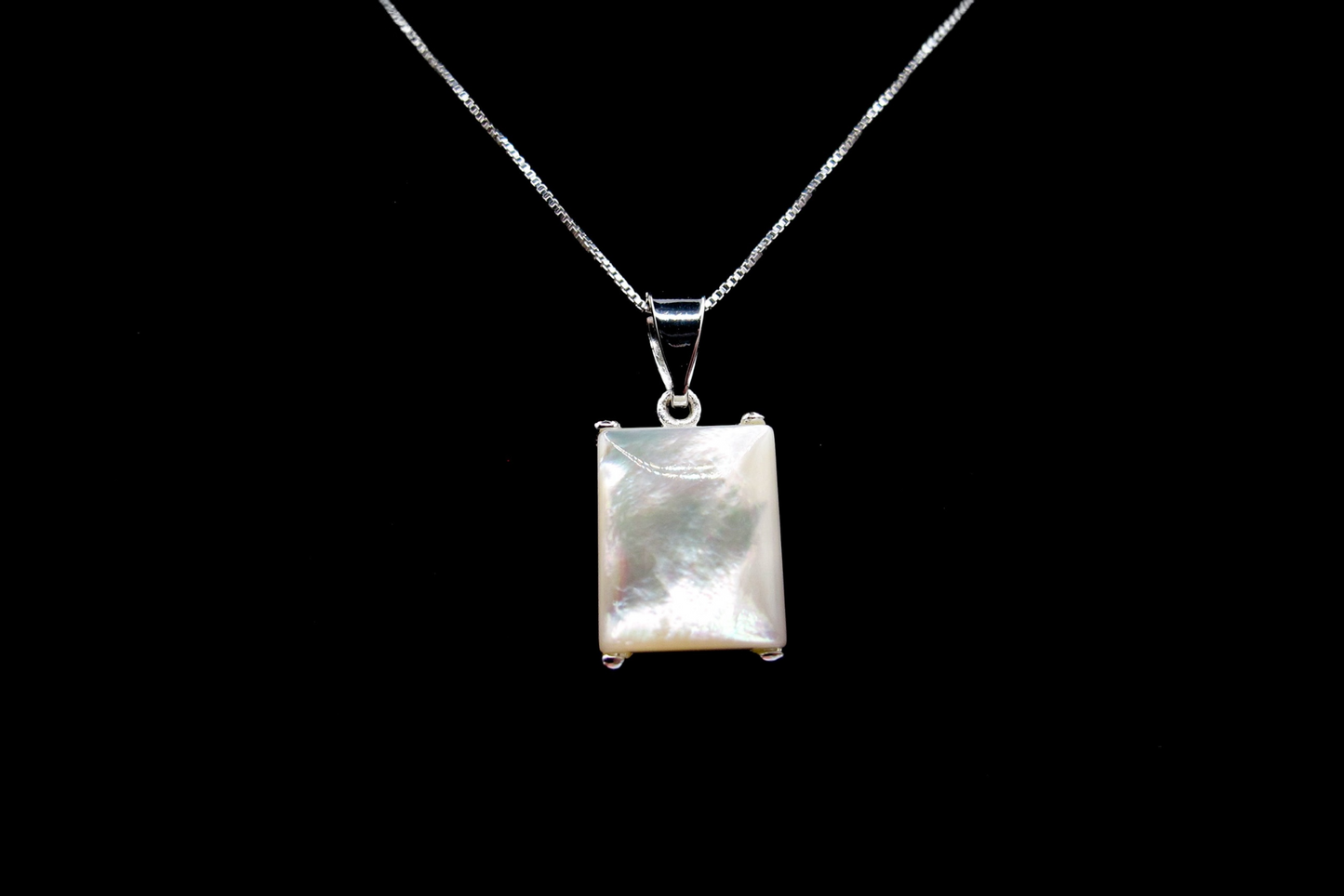 Maya - Sterling Silver frame pendant with mother of pearl on a Sterling Silver chain