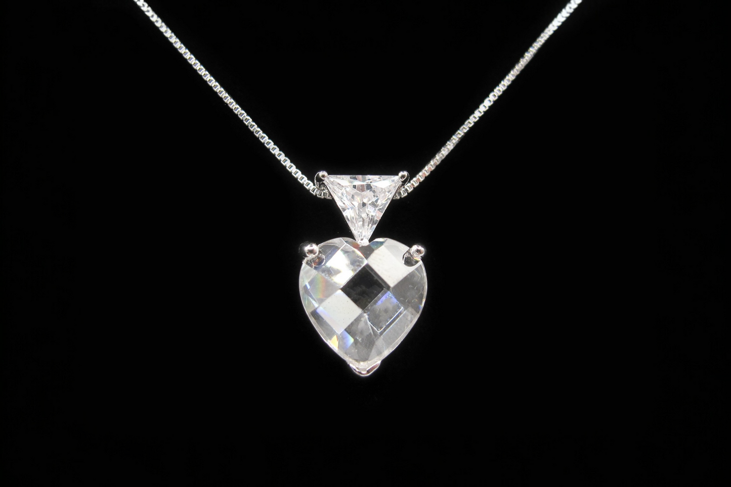 Mia - Sterling Silver Pendant with triangular CZ and genuine crystal heart shape on a Sterling Silver chain