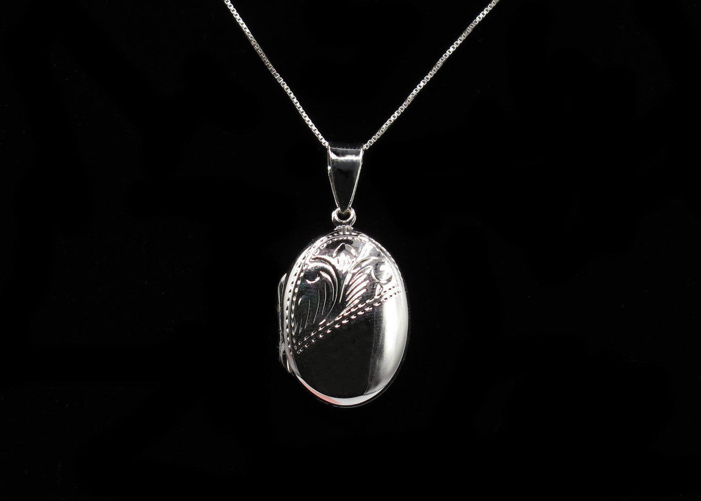 Mackenzie - Oval Shaped Sterling Silver partially engraved Locket