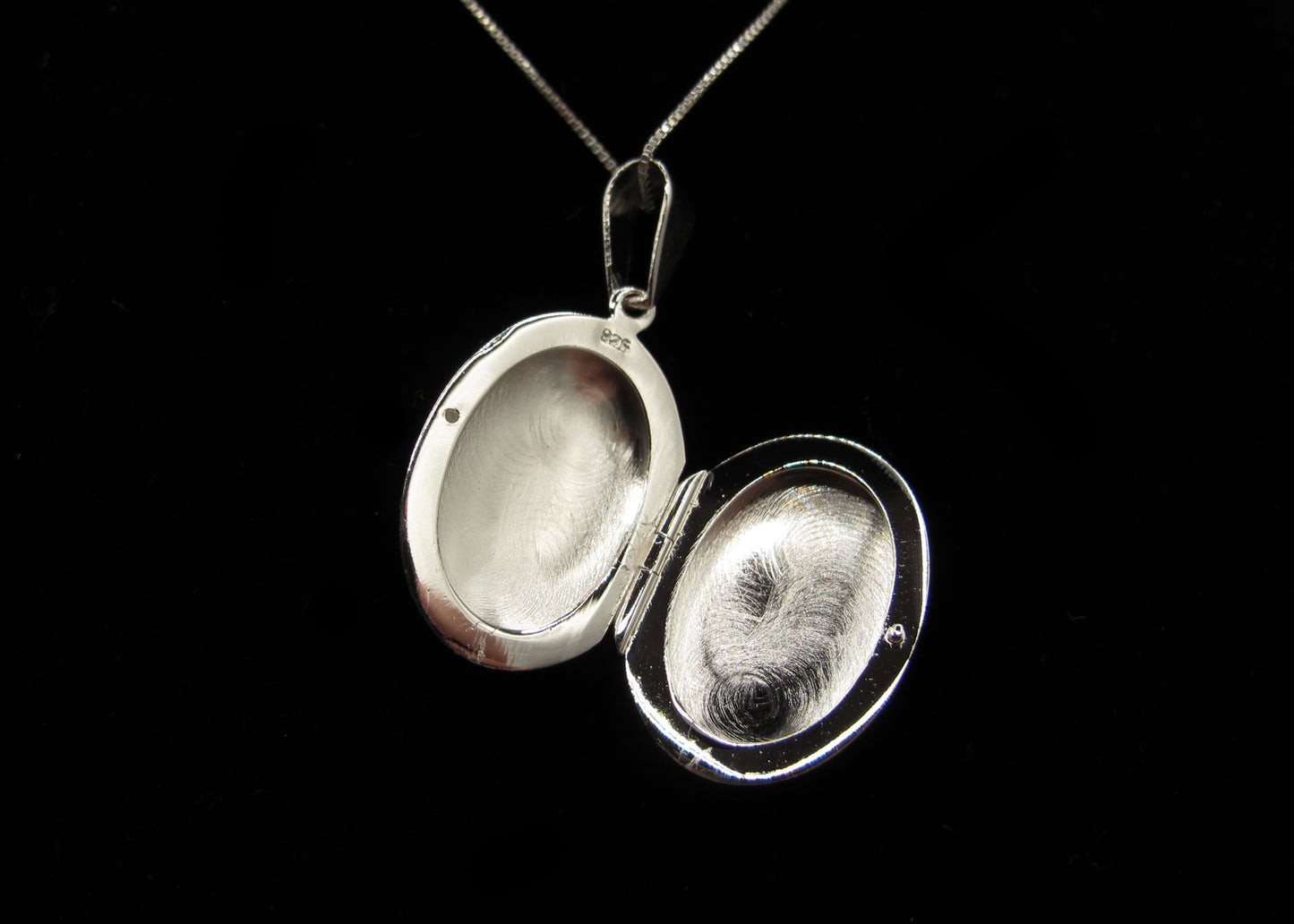 Mackenzie - Oval Shaped Sterling Silver partially engraved Locket