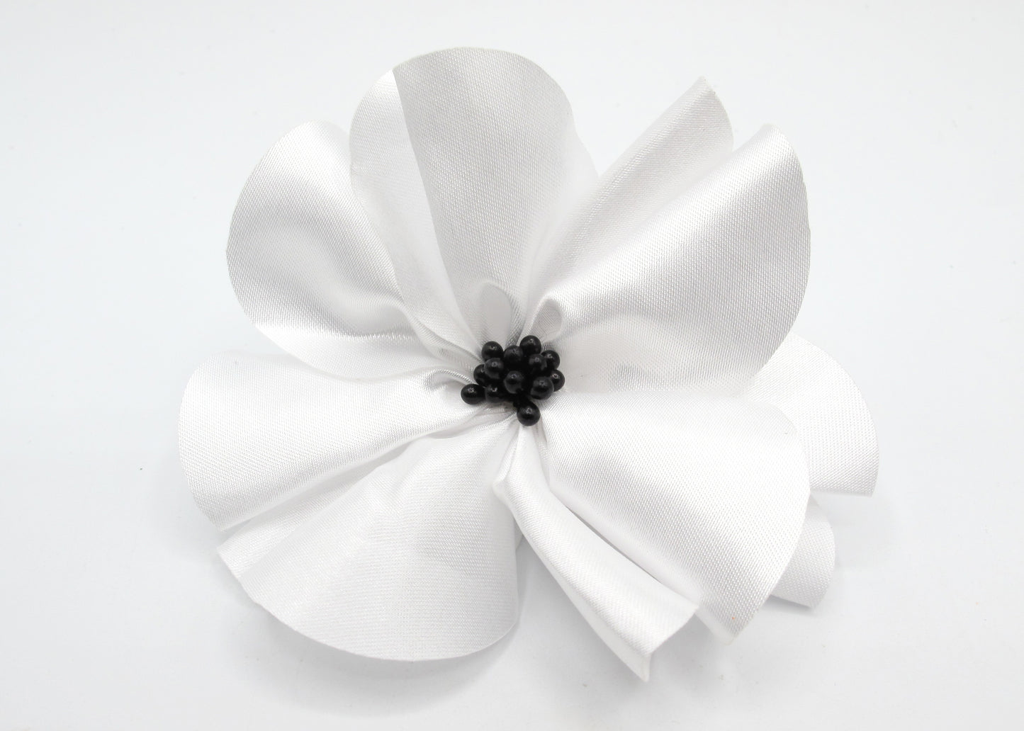 Filomena - Fleurs pour cheveux en tissu soyeux avec pince à cheveux et élastique à cheveux noir